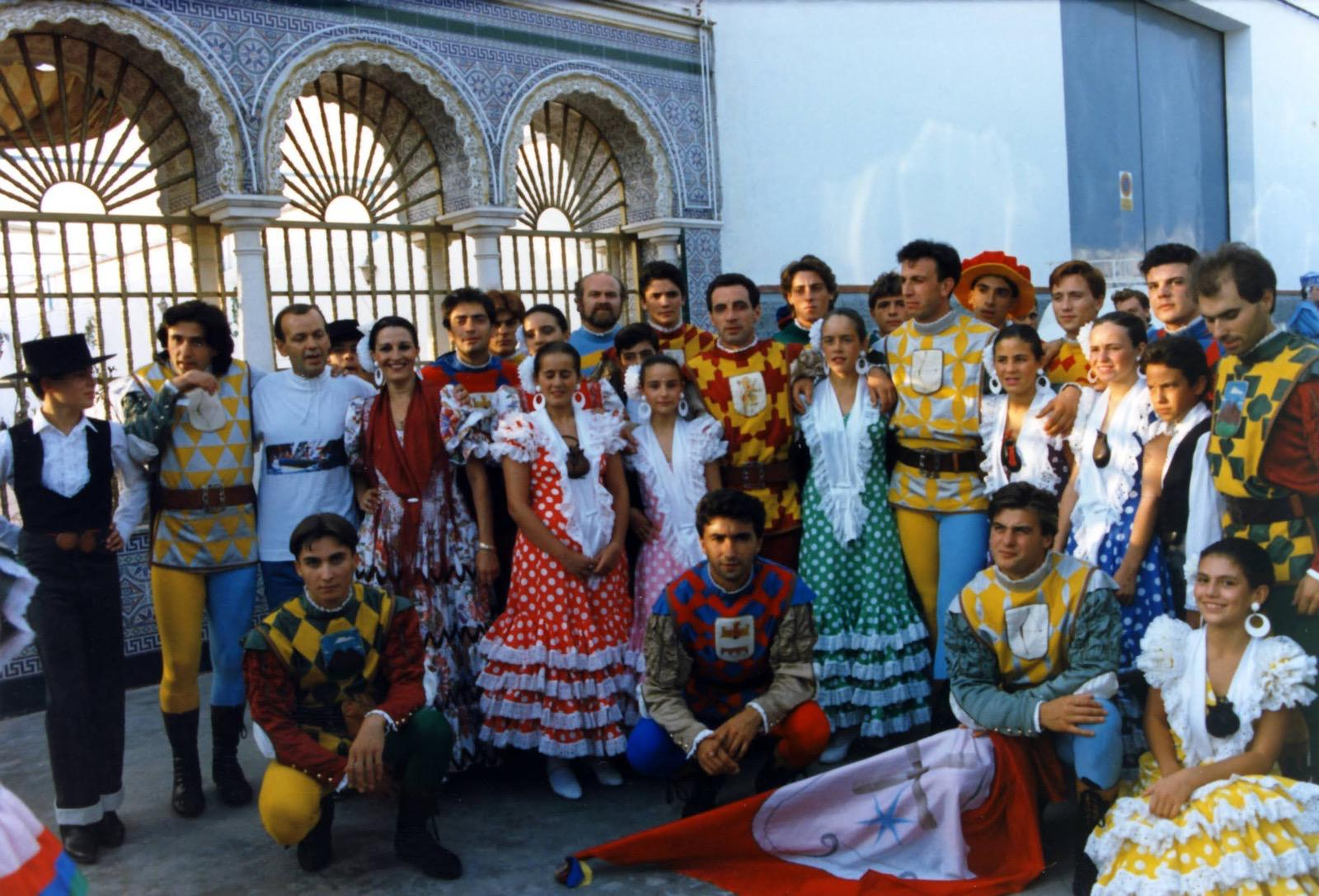 The Flag-Wavers of the Rioni of Cori in costume with a folk group during a trip abroad